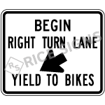 Begin Right Turn Lane Yield To Bikes Sign